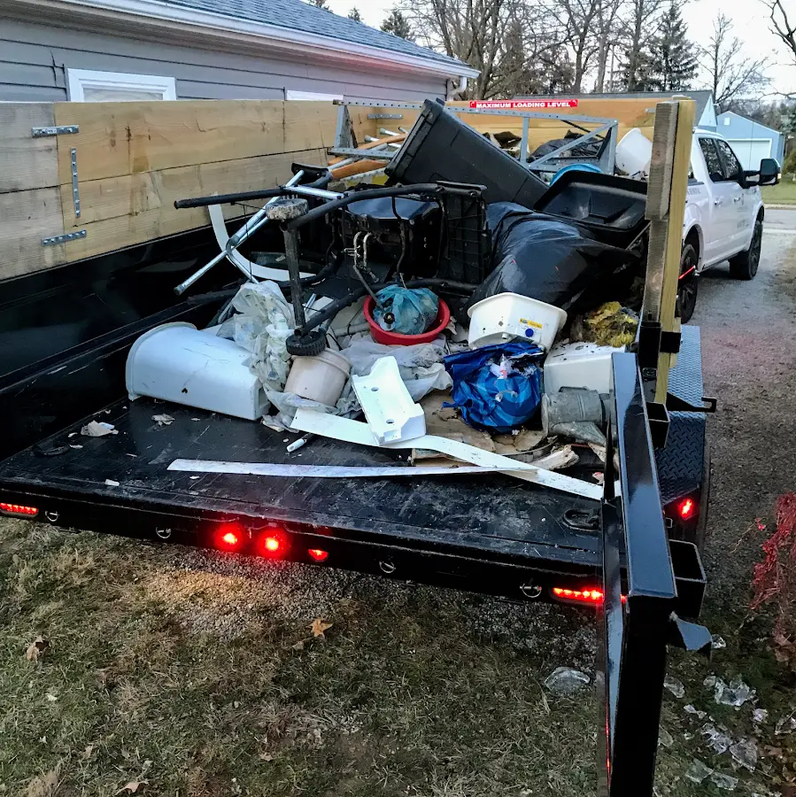 Roll-off dumpster delivered to a residential driveway in Torrington